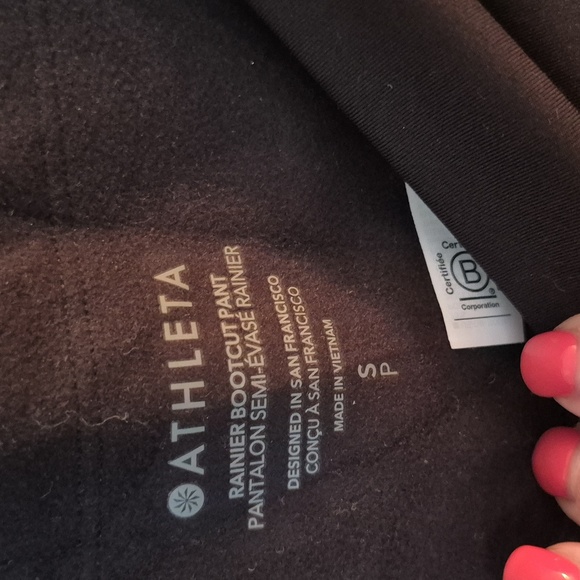 NWT Athleta Rainer Bootcut Pant Reflective Zip Pockets Compression Black Size S - Picture 9 of 10